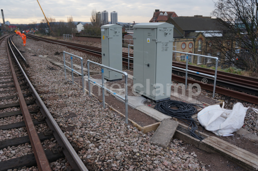 Interclamp tube clamp fittings used to construct a modular balustrade safety post system along a railway, providing protection for work personnel against dangerous surroundings.